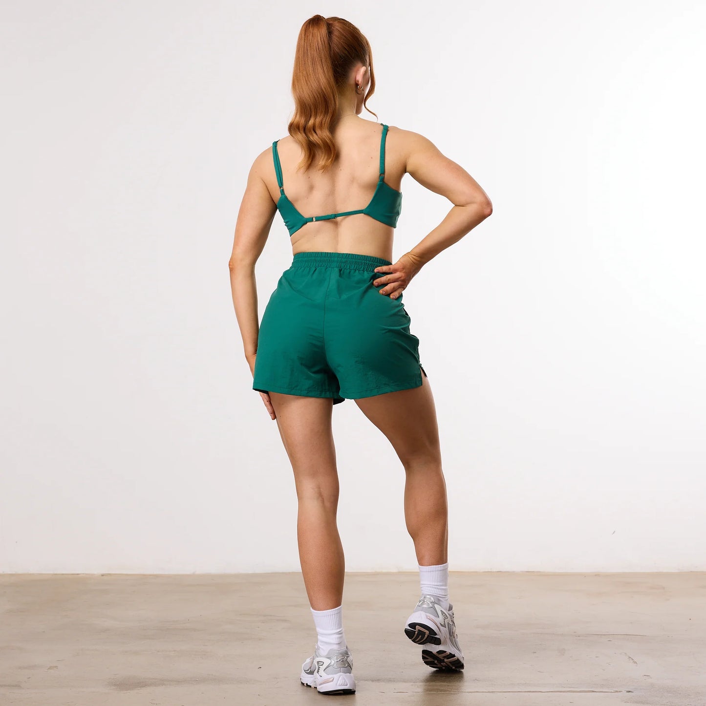 VANQUISH/ ENHANCE FOREST GREEN TRACK SHORTS WOMAN