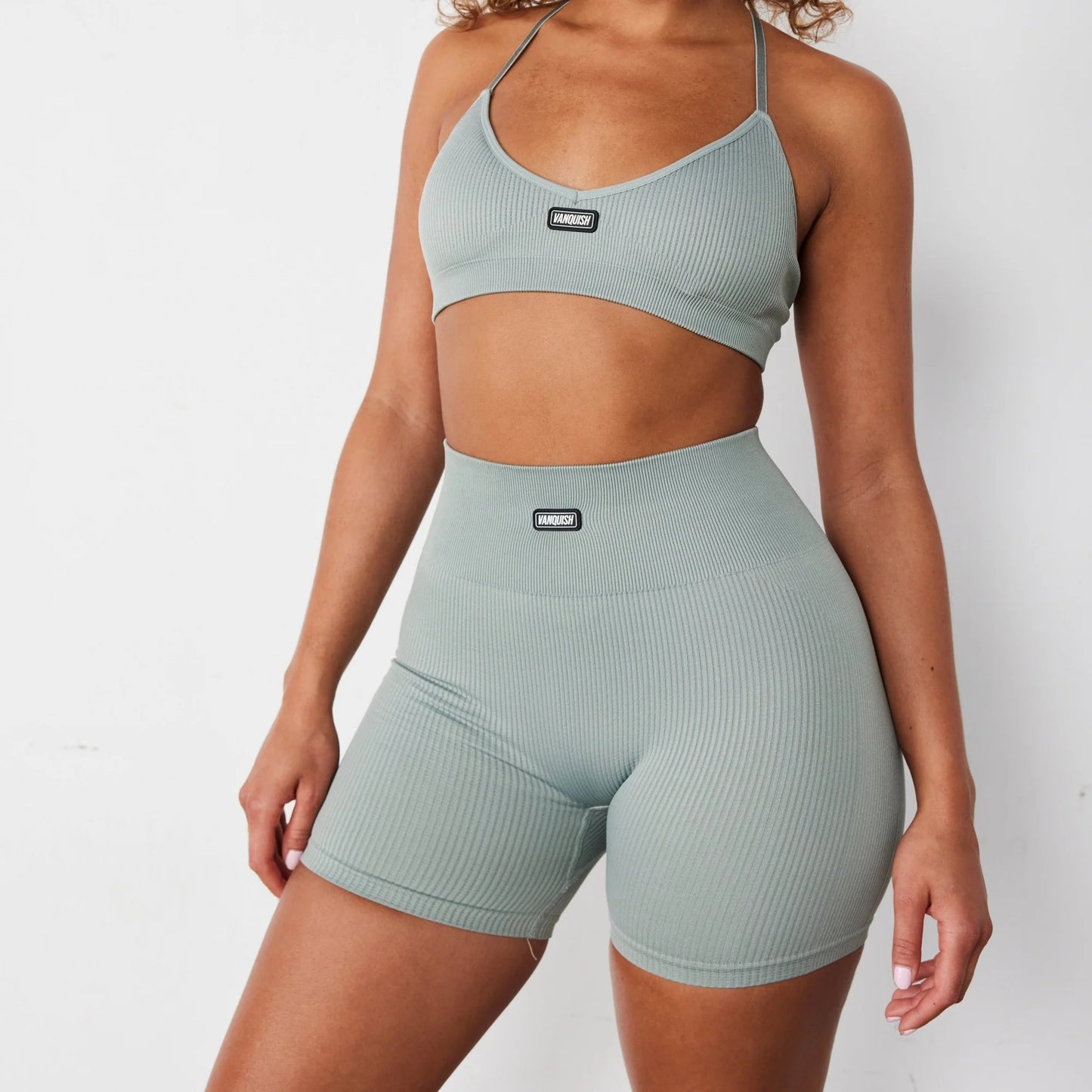 VANQUISH/ RIBBED SEAMLESS SLATE GREY CROSS BACK LOW SUPPORT BRA WOMAN
